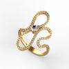 Gold and diamond ribbon ring